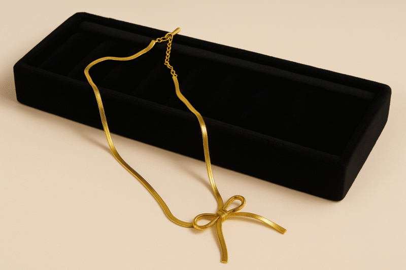 Elegant Gold-Tone Herringbone Bow Necklace – Minimalist Ribbon Design - Image 2
