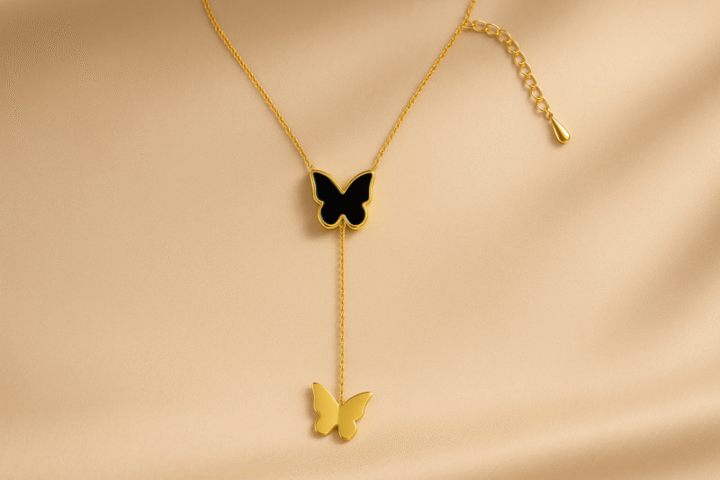 Elegant Dual Butterfly Pendant Necklace – Gold & Black Enamel Finish - Image 2