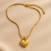 Radiant Heart Pendant Necklace – Gold Finish with Star Detail & Crystal Accents