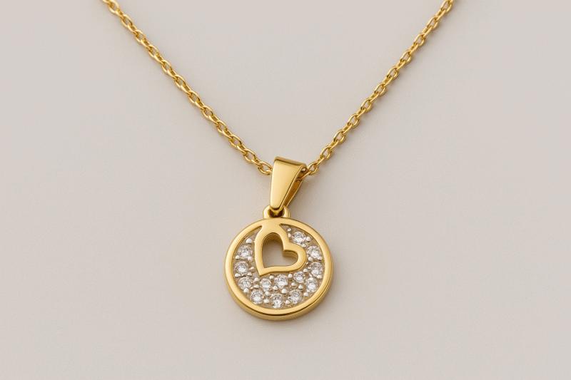 Golden Circle of Love Pendant – Heart Cutout with Crystal Inlay