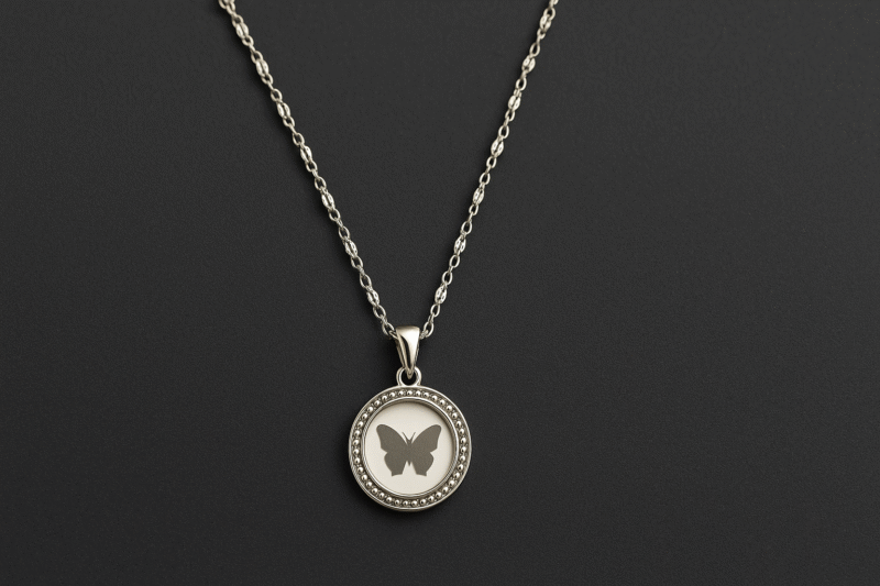 Elegant Silver Butterfly Pendant Necklace with Crystal-Embellished Border - Image 2