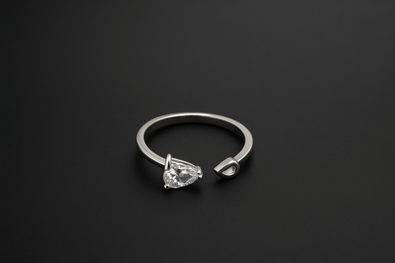 Teardrop Elegance Ring – Adjustable Silver Band with Pear-Cut Center Stone Accent - Image 2