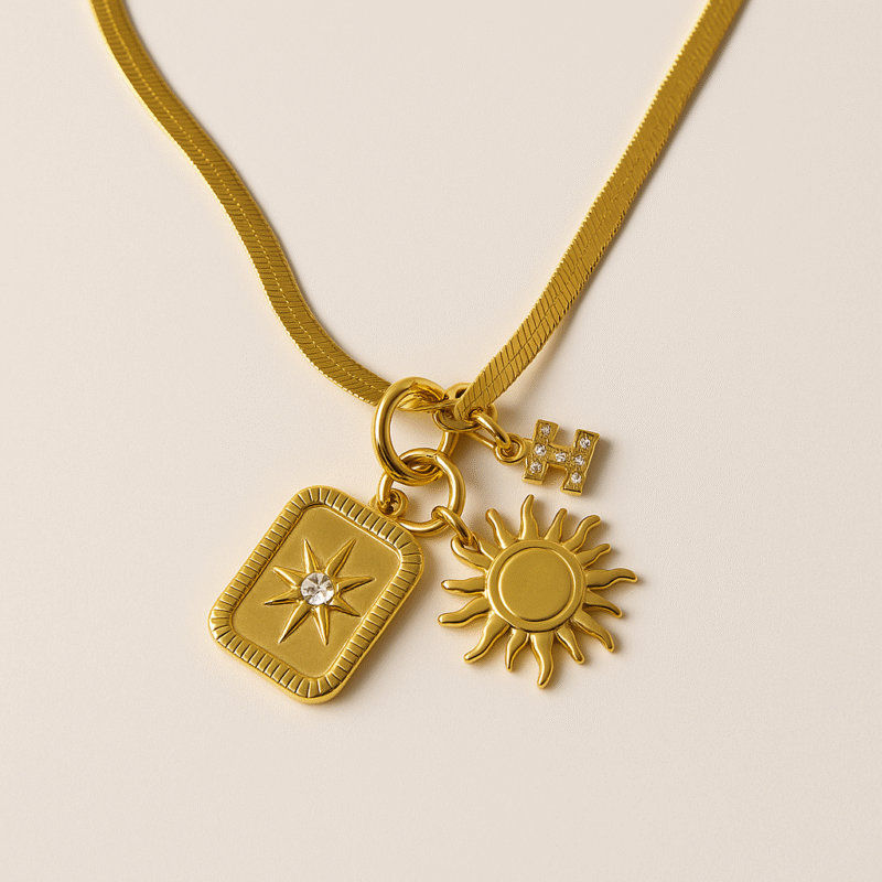 Gold-Tone Charm Necklace with Sun, Star, and Letter Pendants – Radiant Boho Luxe Style - Image 2
