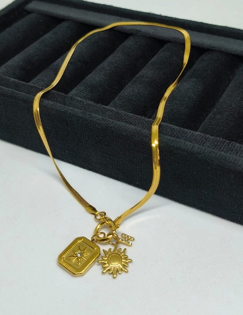 Gold-Tone Charm Necklace with Sun, Star, and Letter Pendants – Radiant Boho Luxe Style - Image 3